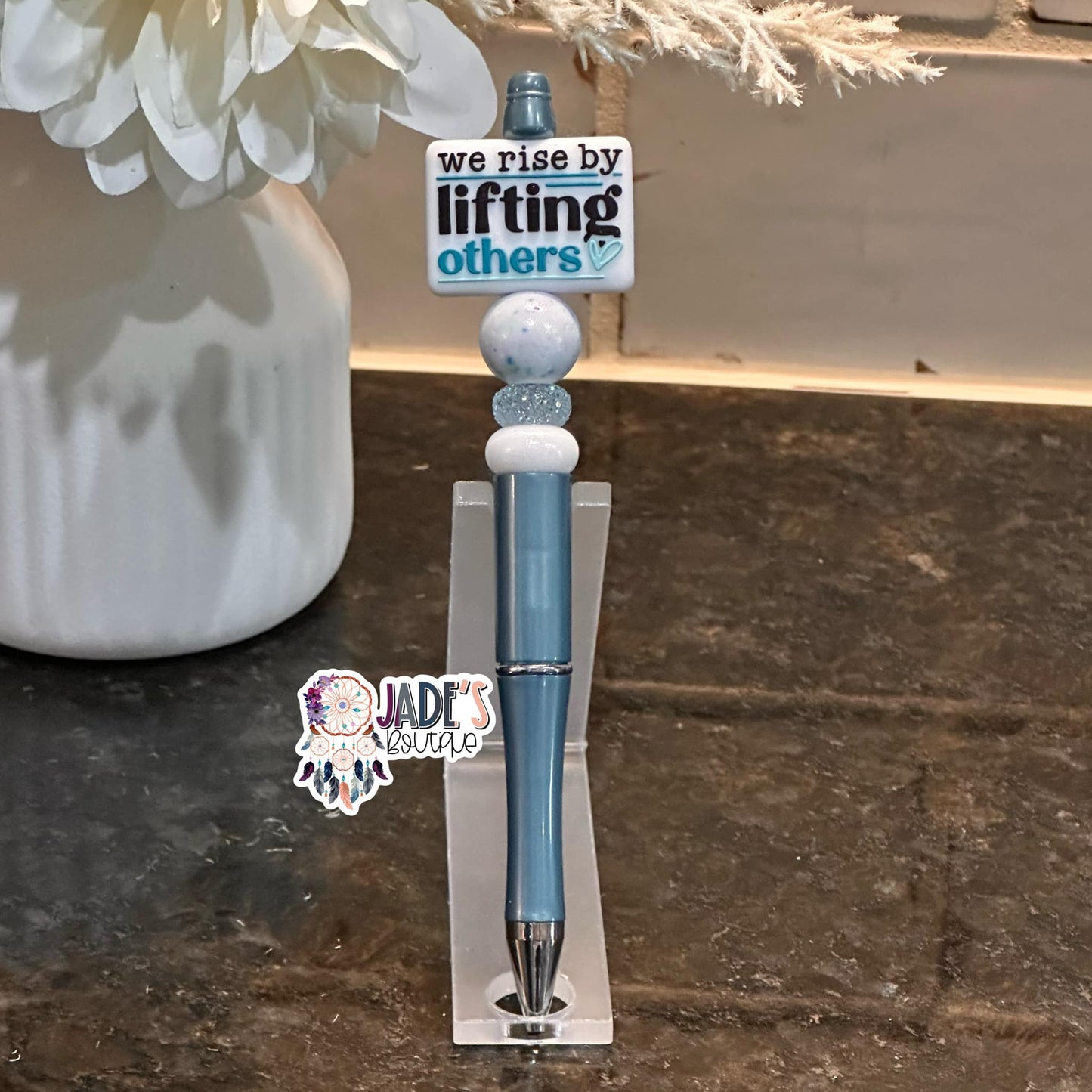 We Rise By Lifting Others Turquoise Pen
