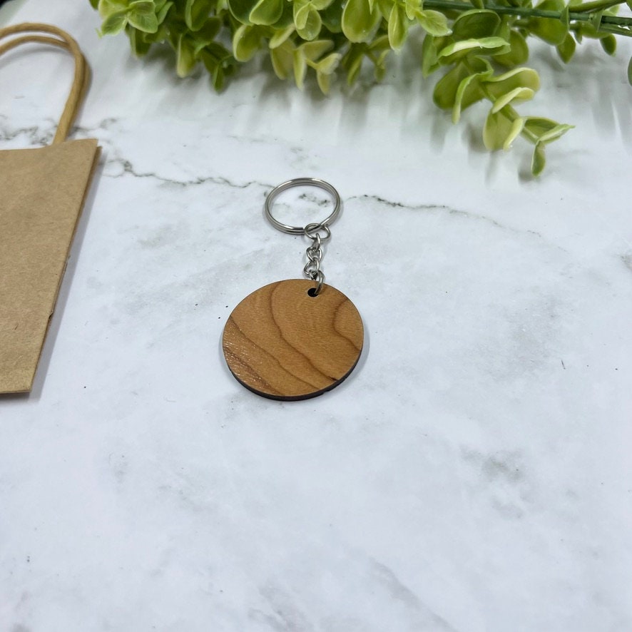 Go Where You Feel The Most Alive Wood Keychain